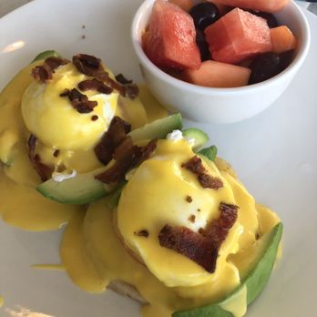 Eggsquisite Cafe - Avocado eggs Benedict with fruit $10.50 - Breakfast & Brunch Near Me - Frisco, Texas