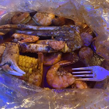 Crafty Crab - Brandon - Seafood boil. A. Snow Crab and Headless Shrimp sausage corn potatoes - Seafood Near Me - Brandon, Florida Crafty Crab - Brandon - Seafood boil. A. Snow Crab and Headless Shrimp sausage corn potatoes - Seafood Near Me - Brandon, Florida