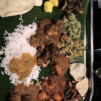 Kumar's - Houston - a plate of food on a banana leaf - Indian Near Me - Houston, Texas