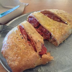 Fox's Pizza Den - Yum!!  This is the meat pizza in a Stromboli. Can you smell the garlic!?!?  It's powerfully great!!