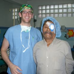 Cosmetic & Reconstructive Eyelid Surgery - Dr. Landmann with one of his humanitarian patients