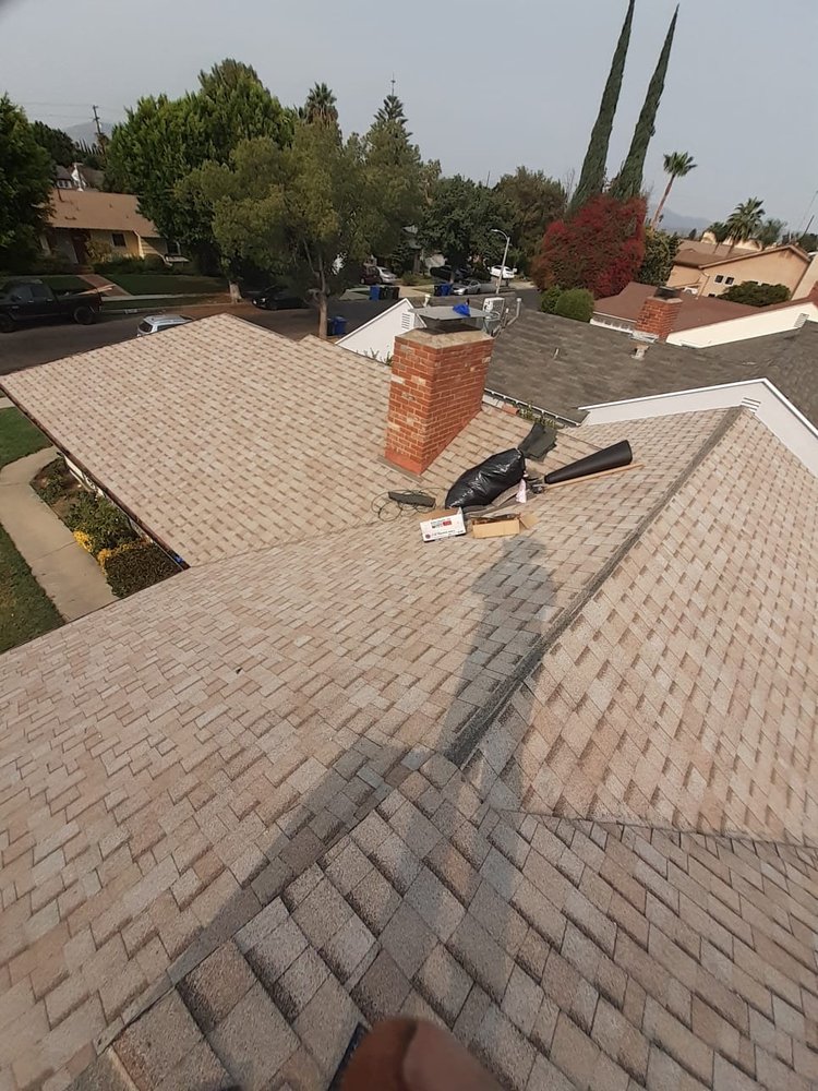 Slide of TopCal Roofing