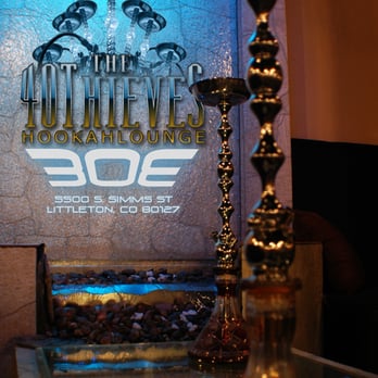 The 40 Thieves Hookah Lounge - a candle and a sign - Hookah Bars Near Me - Littleton, Colorado The 40 Thieves Hookah Lounge - a candle and a sign - Hookah Bars Near Me - Littleton, Colorado