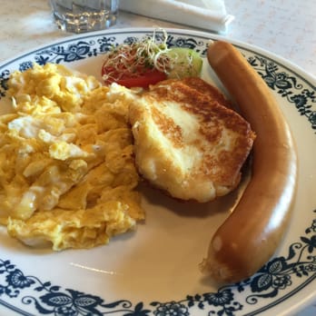 Hastings Snack Bar - Polish Breakfast - 2 eggs, parowka (polish weenie), 2 potato pancakes, and polish bread on the side - Polish Near Me - Toronto, Ontario Hastings Snack Bar - Polish Breakfast - 2 eggs, parowka (polish weenie), 2 potato pancakes, and polish bread on the side - Polish Near Me - Toronto, Ontario
