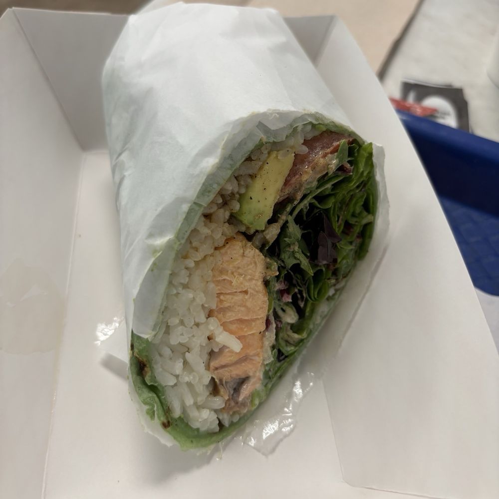 Fish King - Half of their delicious salmon burrito. - Seafood Markets Near Me - Glendale, California Fish King - Half of their delicious salmon burrito. - Seafood Markets Near Me - Glendale, California