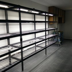We grow in a Converted two-car garage with LED lights and air-conditioning.