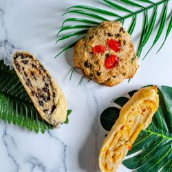 Camella's Kitchen - Trini Baked Goods Box featuring our coconut drops (buns), currants roll, and cheese roll. Photo by Takera Gholson of Flights and Foods.