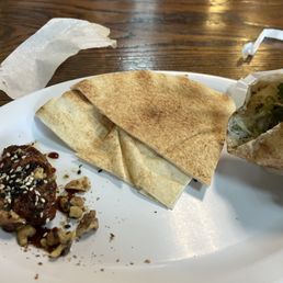 Chicken shawarma with a mini side of Muhammara Chicken shawarma with a mini side of Muhammara