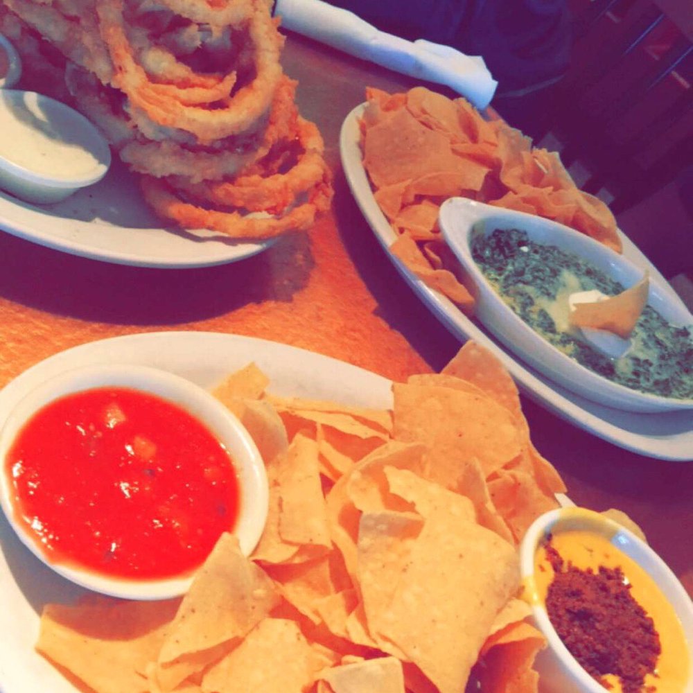 Cheddar's Scratch Kitchen - A few of the appetizers the onion rings the spinach dip and the chips and queso all very good - American Near Me - Tyler, Texas Cheddar's Scratch Kitchen - A few of the appetizers the onion rings the spinach dip and the chips and queso all very good - American Near Me - Tyler, Texas