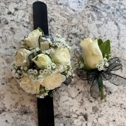 Belinda's Blooms - $39.99 for this corsage and boutonniere set. These can be ordered seperately. $29.99 for the corsage and $9.99 for the boutonniere.
