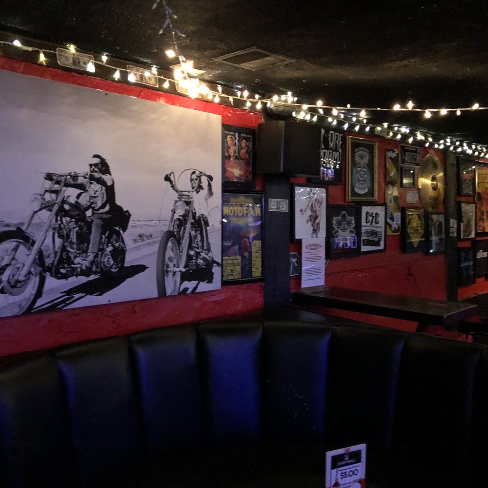 Chopper John's - a black and white photo of a motorcycle - Dive Bars Near Me - Phoenix, Arizona