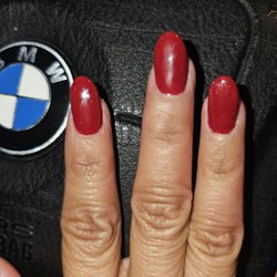 Glow Nails Spa - Middle and pointing finger lopsided and my nails look like it gained some belly weight