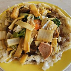 Pho Ap Chao Don- deep fried rice noodles with veggies/veggie meat and gravy $15 Delicious! 5 stars