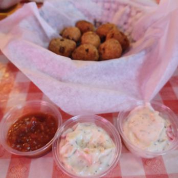 Catfish Charlie's - Basket of Hush Puppies with both cocktail and tarter sayces - Seafood Near Me - Corpus Christi, Texas Catfish Charlie's - Basket of Hush Puppies with both cocktail and tarter sayces - Seafood Near Me - Corpus Christi, Texas