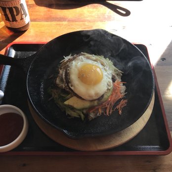 Mura Asian Eatery - Bibim-Bowl with bulgogi and avocado in the sizzling skillet. - Japanese Near Me - Seattle, Washington Mura Asian Eatery - Bibim-Bowl with bulgogi and avocado in the sizzling skillet. - Japanese Near Me - Seattle, Washington