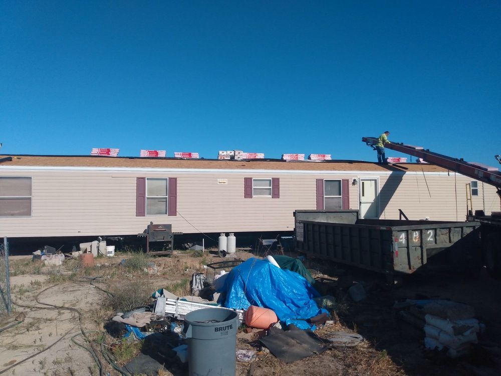 Slide of Outlaw Roofing