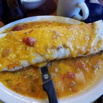 Sam's No 3 - Spero's breakfast burrito with bacon, topped with cheddar and pork chili - Breakfast & Brunch Near Me - Denver, Colorado Sam's No 3 - Spero's breakfast burrito with bacon, topped with cheddar and pork chili - Breakfast & Brunch Near Me - Denver, Colorado