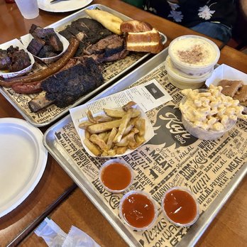 Kafi BBQ - Dino rib, oxtail, pomegranate burnt ends, sausage, brisket, lamb ribs, Mac & cheese, tallow fries, banana pudding, traditional dessert - Barbeque Near Me - Irving, Texas Kafi BBQ - Dino rib, oxtail, pomegranate burnt ends, sausage, brisket, lamb ribs, Mac & cheese, tallow fries, banana pudding, traditional dessert - Barbeque Near Me - Irving, Texas