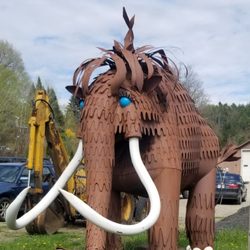 Kmiec's Garage - Kmiec's garage has a metal mammoth by their parking lot