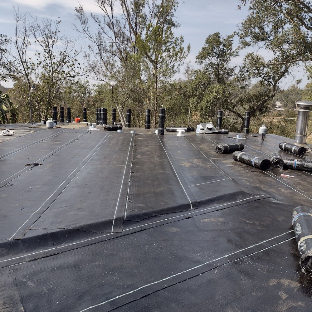 Slide of Mendez roofing