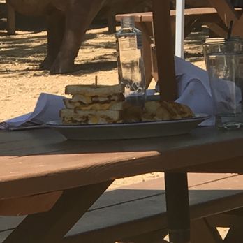 The Rustic - There's my buddy's sandwich on the other table.  Took them an hour to figure it out. But hey! Cold Play kids are there are the 21st. - New American Near Me - Dallas, Texas