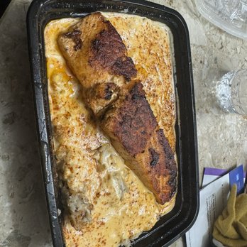 Cafe 1137 - Salmon and rice with delicious cream sauce - Seafood Near Me - Milford Mill, Maryland