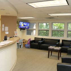 Calcaterra Family Dentistry - Our reception area with plenty of natural light and comfy sofas.