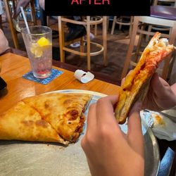 Pizza Man - Flat, not so stuffed Chicken Parm calzone after new owners.