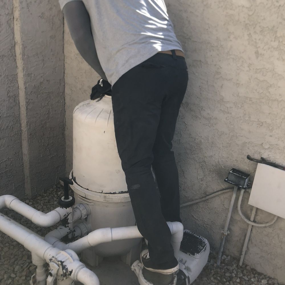 SunBright Pool Services - Emplyee standing on my pool equipment - Pool Cleaners Near Me - Phoenix, Arizona SunBright Pool Services - Emplyee standing on my pool equipment - Pool Cleaners Near Me - Phoenix, Arizona