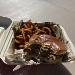Pulled pork with pickles and onion ring