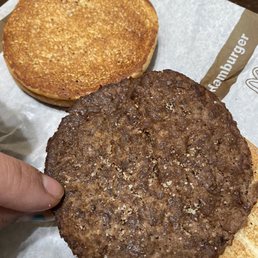 a hamburger and two pancakes a hamburger and two pancakes
