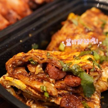 Northeast Sisters - a close up of a plate of food - Chinese Near Me - Costa Mesa, California Northeast Sisters - a close up of a plate of food - Chinese Near Me - Costa Mesa, California