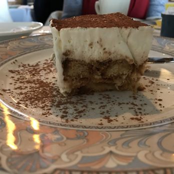 Basilio Inn - The Tiramisu $8. Made fresh in house. The 4 of us shared 1 order. - Italian Near Me - Staten Island, New York Basilio Inn - The Tiramisu $8. Made fresh in house. The 4 of us shared 1 order. - Italian Near Me - Staten Island, New York