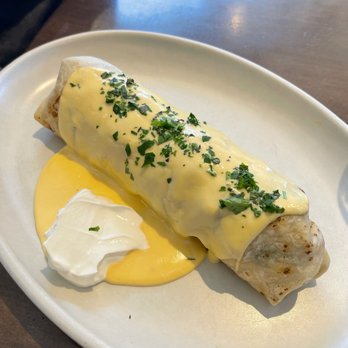 Culinary Dropout - Breakfast Burrito (egg, sausage, crispy potato, avocado, sour cream, provolone fondue) - New American Near Me - Tucson, Arizona Culinary Dropout - Breakfast Burrito (egg, sausage, crispy potato, avocado, sour cream, provolone fondue) - New American Near Me - Tucson, Arizona