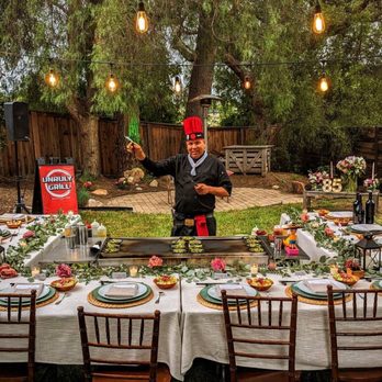 The Unruly Grill - a man preparing a meal - Caterers Near Me The Unruly Grill - a man preparing a meal - Caterers Near Me