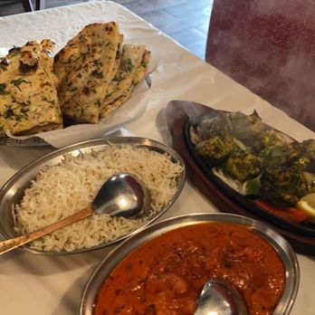 Three Leaf Nepalese Indian Cuisine - Chicken Tikka Hariyali, Butter Chicken (Spicy), Garlic Naan - Indian Near Me - Houston, Texas Three Leaf Nepalese Indian Cuisine - Chicken Tikka Hariyali, Butter Chicken (Spicy), Garlic Naan - Indian Near Me - Houston, Texas