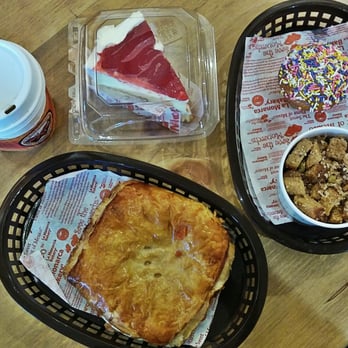 La Monarca Bakery & Cafe - Ham cheese and chipotle crossaint, capirotada, strawberry cheesecake & cupcake with sprinkles - Bakeries Near Me - Whittier, California