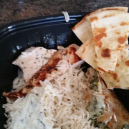 Meal came w/ a microwave reheated, griddle cooked chicken breast. Sauce seen on the rice was donated by my husbands platter. Meal came w/ a microwave reheated, griddle cooked chicken breast. Sauce seen on the rice was donated by my husbands platter.