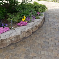 Palms Tree Service & Landscaping - Paver driveway built around existing island garden