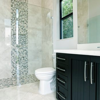 Dold Developments - a modern bathroom with a walk in shower - General Contractors Near Me Dold Developments - a modern bathroom with a walk in shower - General Contractors Near Me