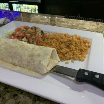 Casa Amigos Tequila Bar & Grill - Grilled chicken burrito topped with cheese dip. :) just a smidge spicy that's all and just enough. Rice on the side. - Mexican Near Me - Coraopolis, Pennsylvania Casa Amigos Tequila Bar & Grill - Grilled chicken burrito topped with cheese dip. :) just a smidge spicy that's all and just enough. Rice on the side. - Mexican Near Me - Coraopolis, Pennsylvania