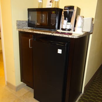 Holiday Inn Express & Suites Saint Augustine North - The room has everything you need -- coffe maker, a fridge, and a microwave. - Hotels Near Me - Saint Augustine, Florida