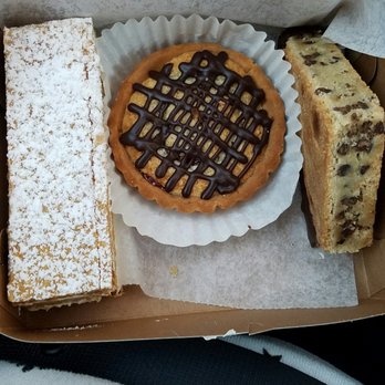 The Kosher Pastry Oven Restaurant - Frome left to right, napoleon, raspberry tart, and Blondie chunk. - Bakeries Near Me - Silver Spring, Maryland The Kosher Pastry Oven Restaurant - Frome left to right, napoleon, raspberry tart, and Blondie chunk. - Bakeries Near Me - Silver Spring, Maryland