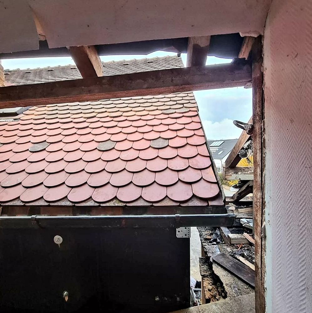 Slide of Alum Rock Roofing