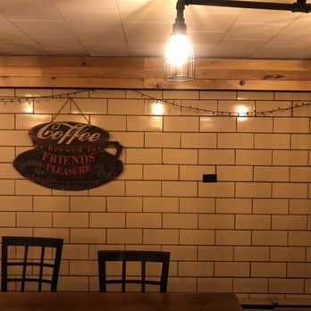 Grounded Coffee House - Signage, lighting, and seating. - Coffee & Tea Near Me - Ligonier, Indiana