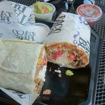 Taco Bus - Spicy pork burrito with guacamole on the side - Mexican Near Me - Lutz, Florida