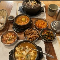 Dumpling tofu soup (bottom) chefs special tofu soup (top) bulgogi stone pot (top) Dumpling tofu soup (bottom) chefs special tofu soup (top) bulgogi stone pot (top)