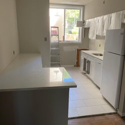 Bucks Renovations - Install kitchen with white counter tops