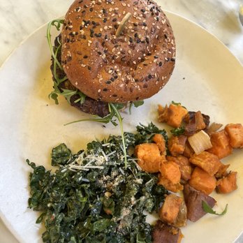 True Food Kitchen - Grass-fed Burger* with Kale Salad and Sweet Potatoes - Vegetarian Near Me - Naples, Florida