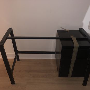 Condor Moving Systems - Bent frame on desk - Movers Near Me - Arlington, Texas